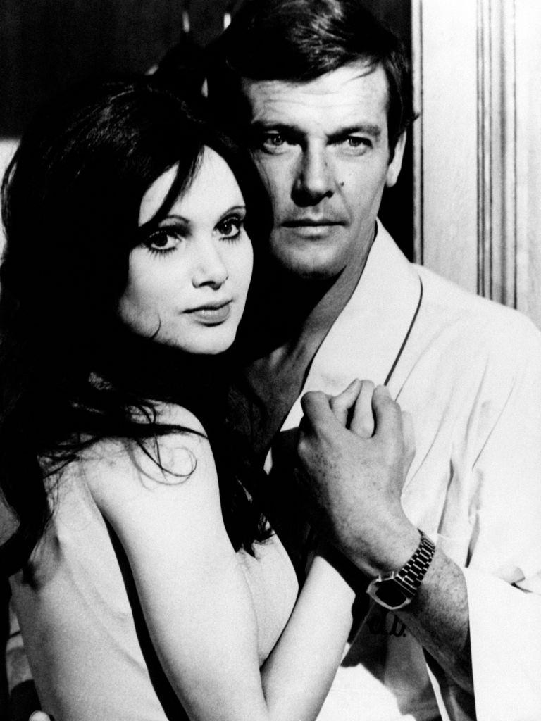 Madeline Smith with Roger Moore in the movie “Live and Let Die”, 1973
