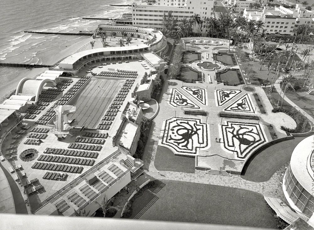 #14 Fontainebleau Hotel, Miami Beach, Roof view of pool, cabanas and garden, 1955