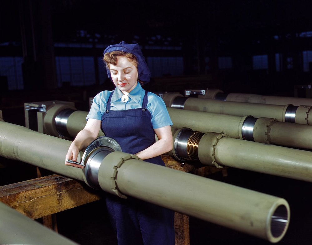 #20 Mrs. Mary Betchner measuring 105mm howitzers at the Milwaukee, Wisconsin, February 1943