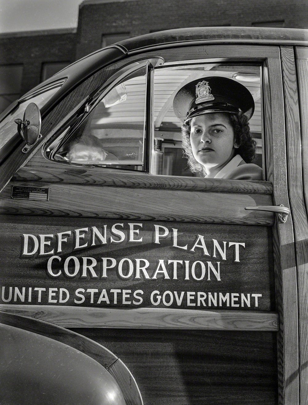 #4 Jewell Halliday, her job is shuttling workers between two Midwest war plants for Allis-Chalmers Manufacturing Co, Milwaukee, 1942