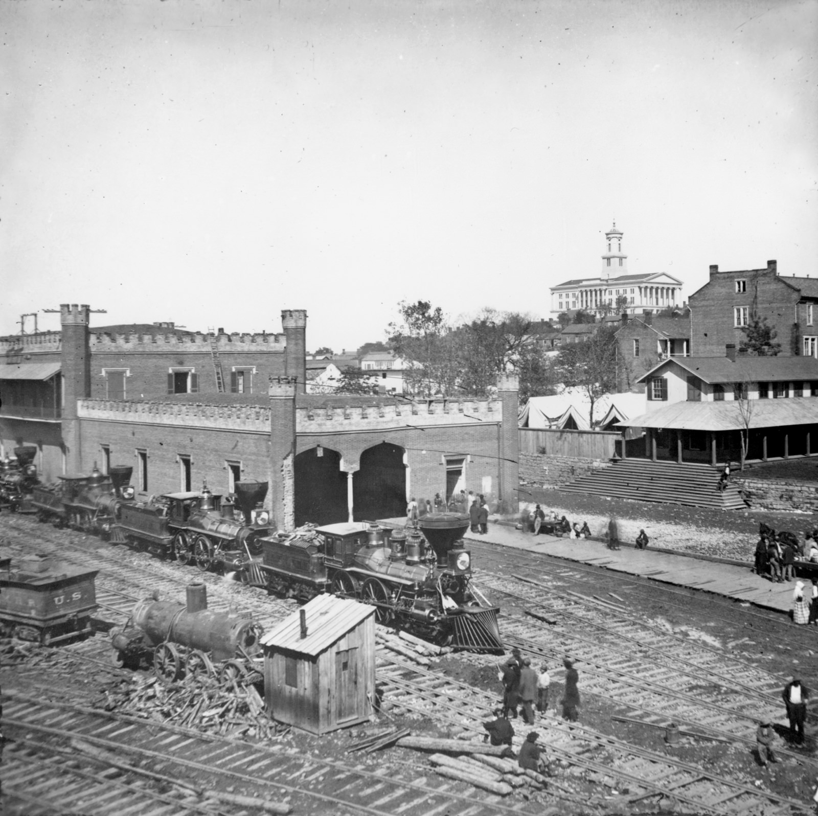 #2 Railroad yard and depot with locomotives; the capitol in the distance, Nashville, Tenn., 1864