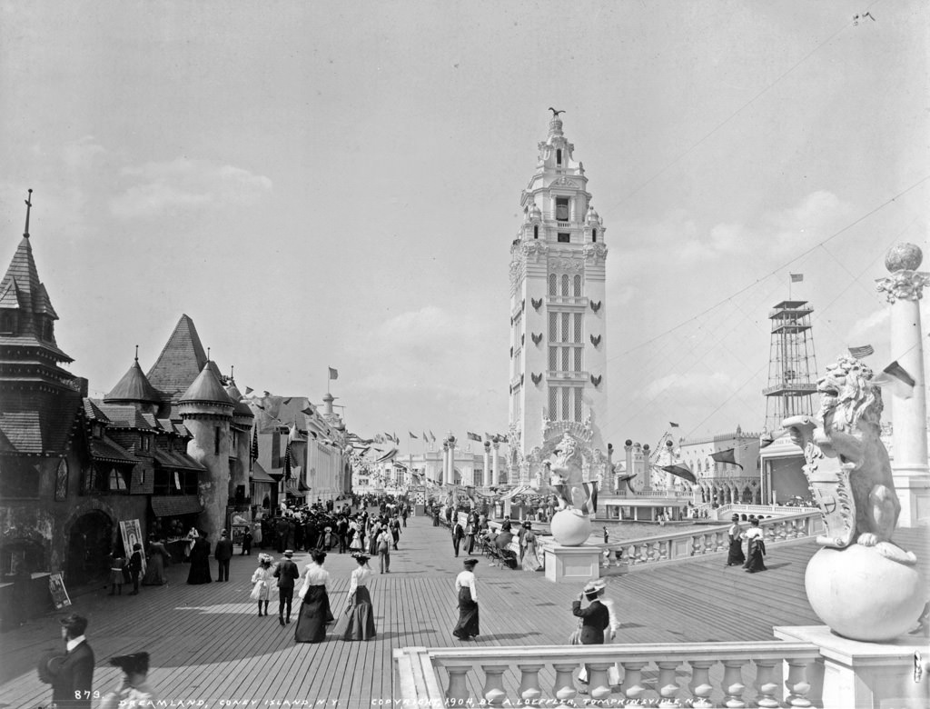 #44 Visitors stroll on the boardwalk at Dreamland, Coney Island, 1904