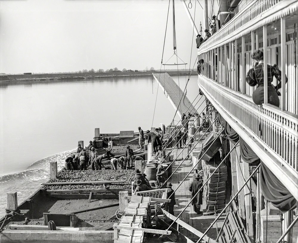 #37 Coaling a river packet underway on the Mississippi near Memphis, 1906