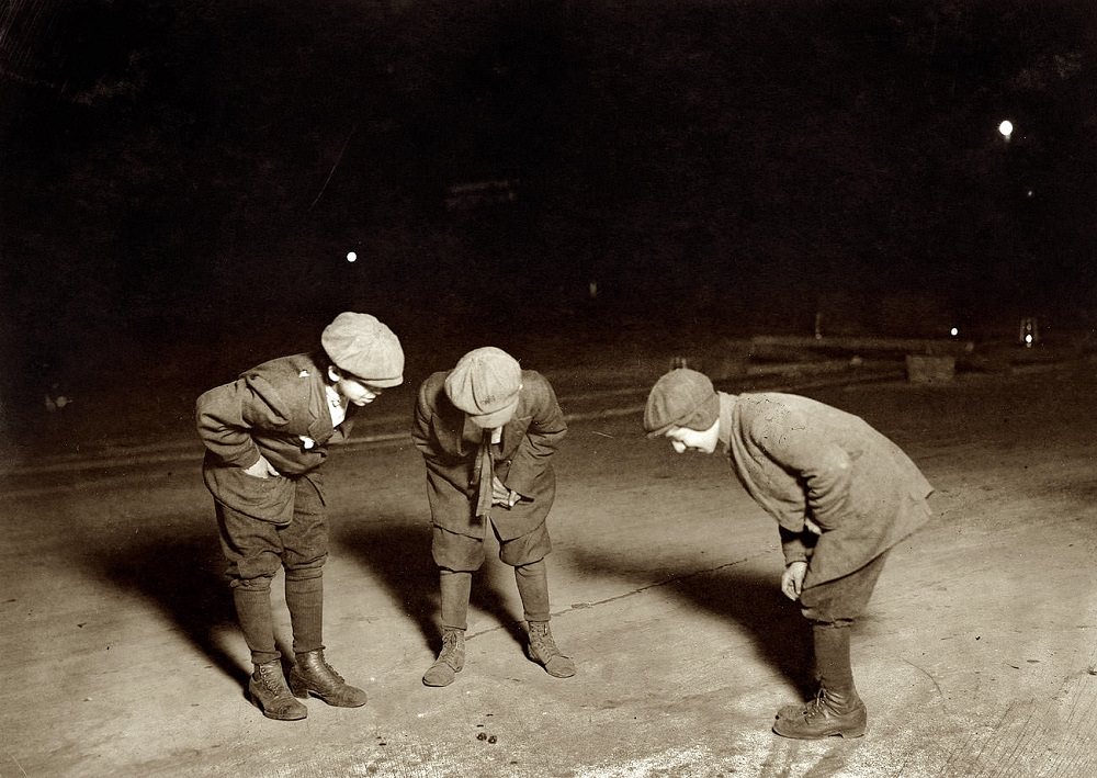#18 A midnight crap game in the street near the Post Office, Providence, Rhode Island, November 23, 1912