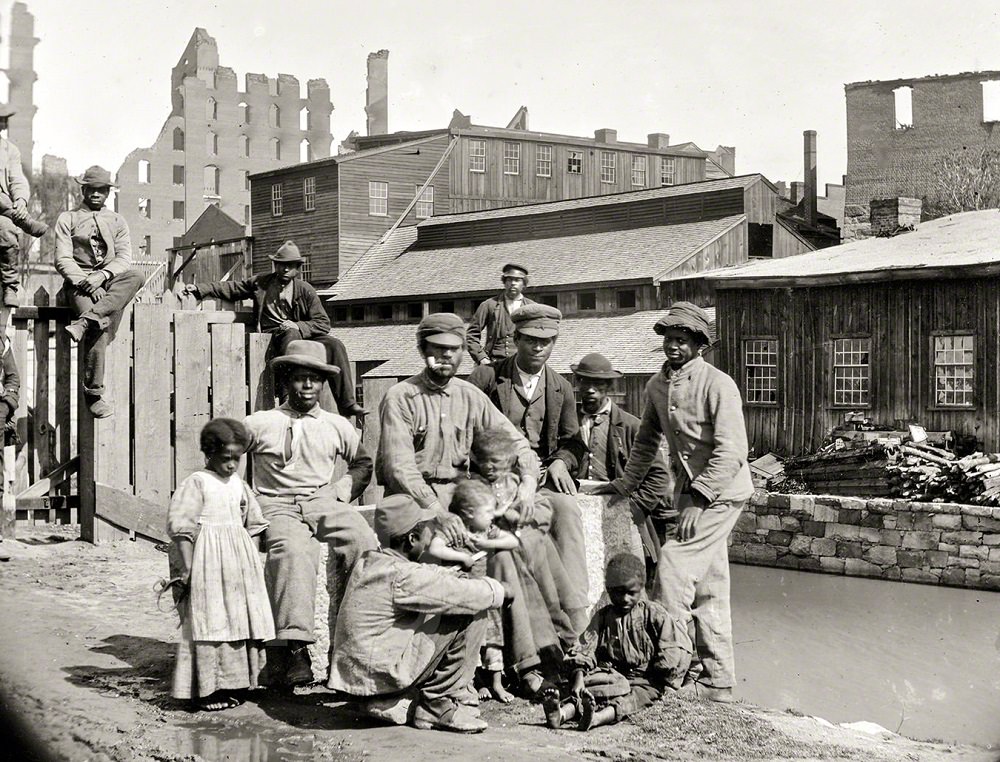 #14 Negro freedmen by canal, a group of Contrabands at Haxall’s Mill, Richmond, June 9, 1865