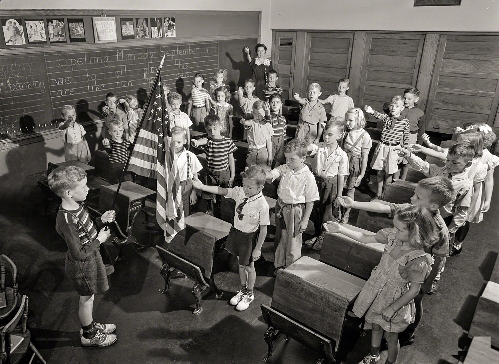 #11 Earl Babcock’s school day begins with the salute to the flag, Rochester, New York, September 1942