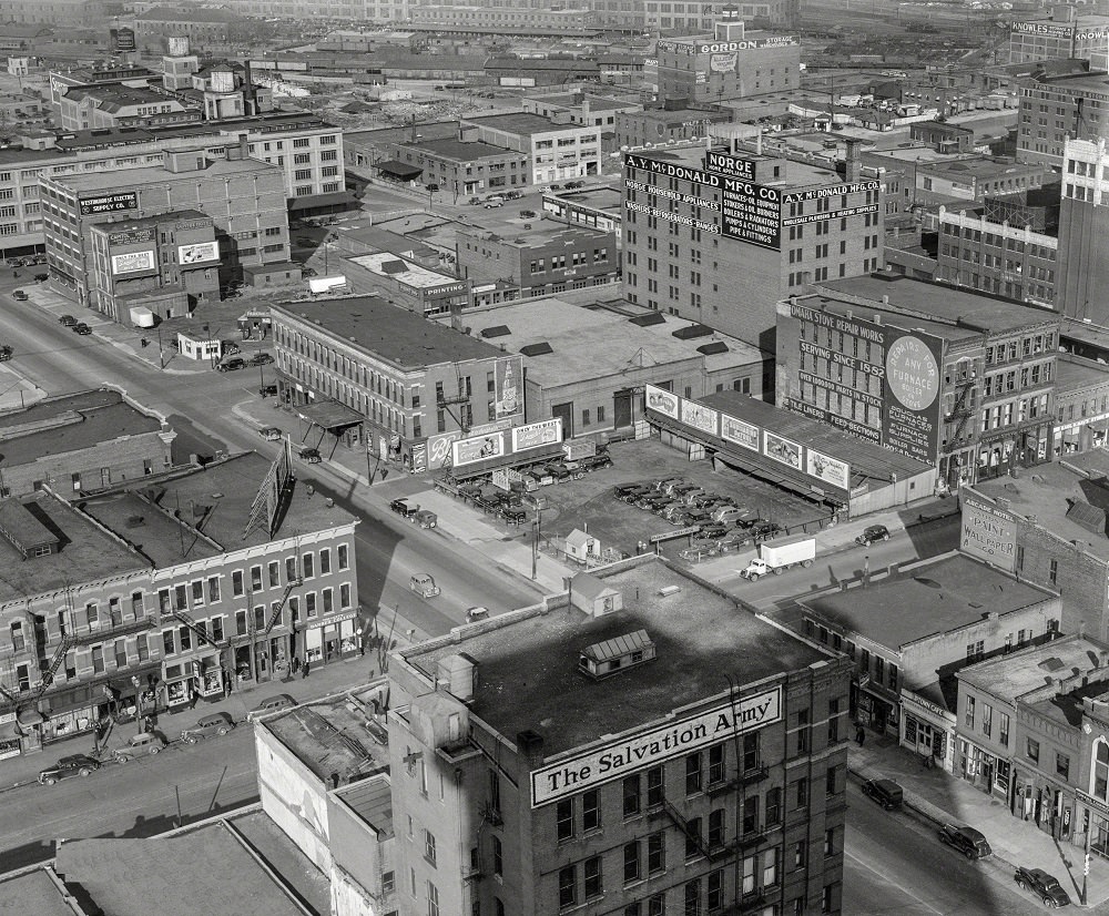 #35 A bird’s-eye view of, among other attractions, Tri-City Barber, Omaha, Nebraska, November 1938