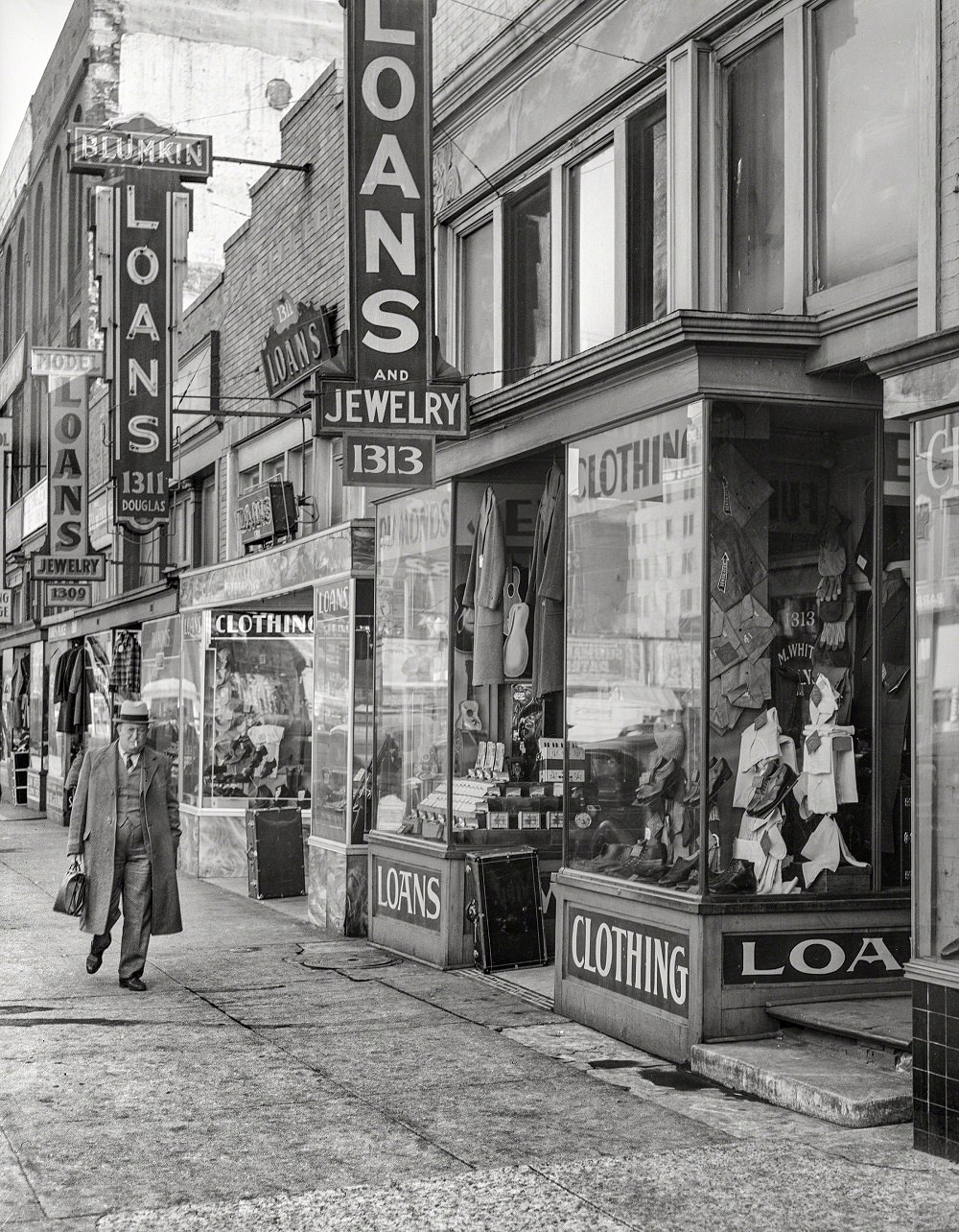 #11 Loan companies on lower Douglas Street, Omaha, Nebraska, November 1938