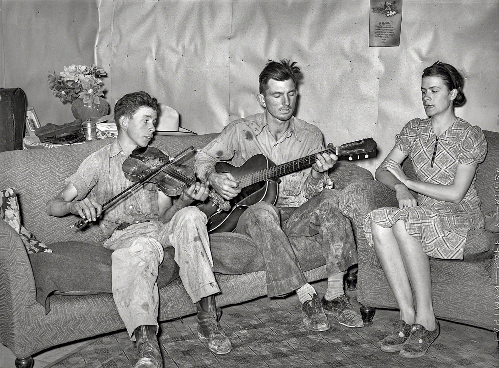 #5 A farmer with his wife and brother in close harmony, Pie Town, New Mexico, June 1940