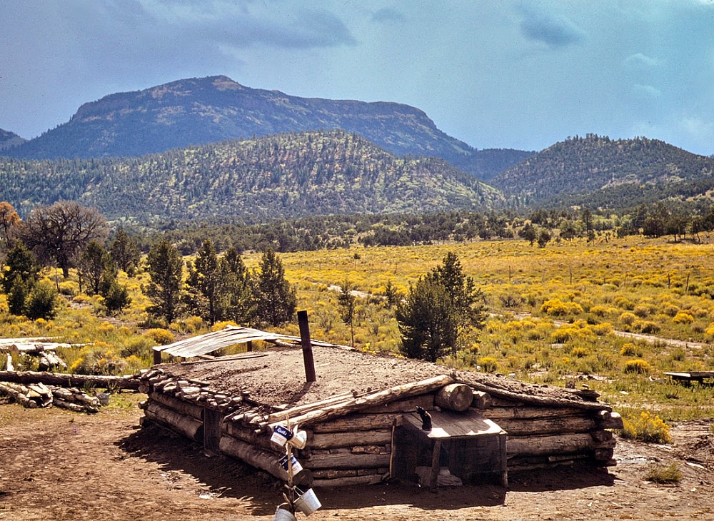 #1 Dugout house of homesteaders Faro and Doris Caudill with Mount Allegro in the background, Pie Town, New Mexico, October 1940