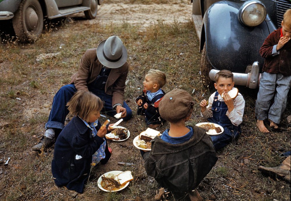 #3 Homesteader and his children eating barbeque at the Pie Town, New Mexico Fair, September 1940