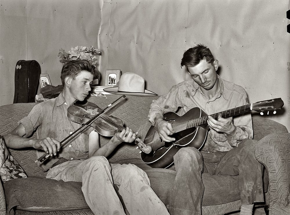 #19 Farmer and his brother making music, Pie Town, New Mexico, June 1940