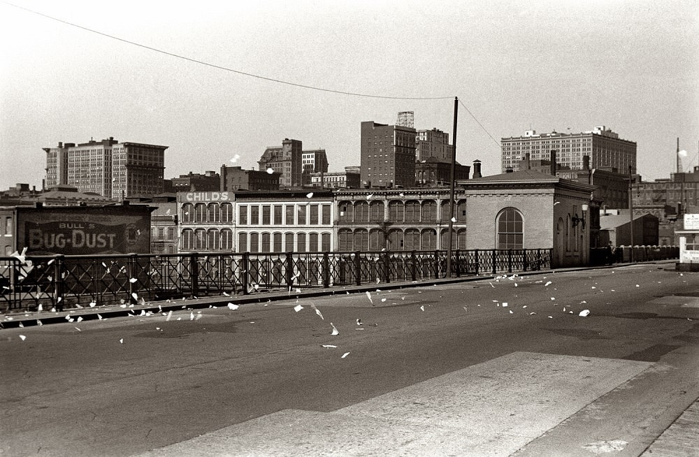 #19 Scraps of paper blowing on bridge, St. Louis, Missouri, May 1940