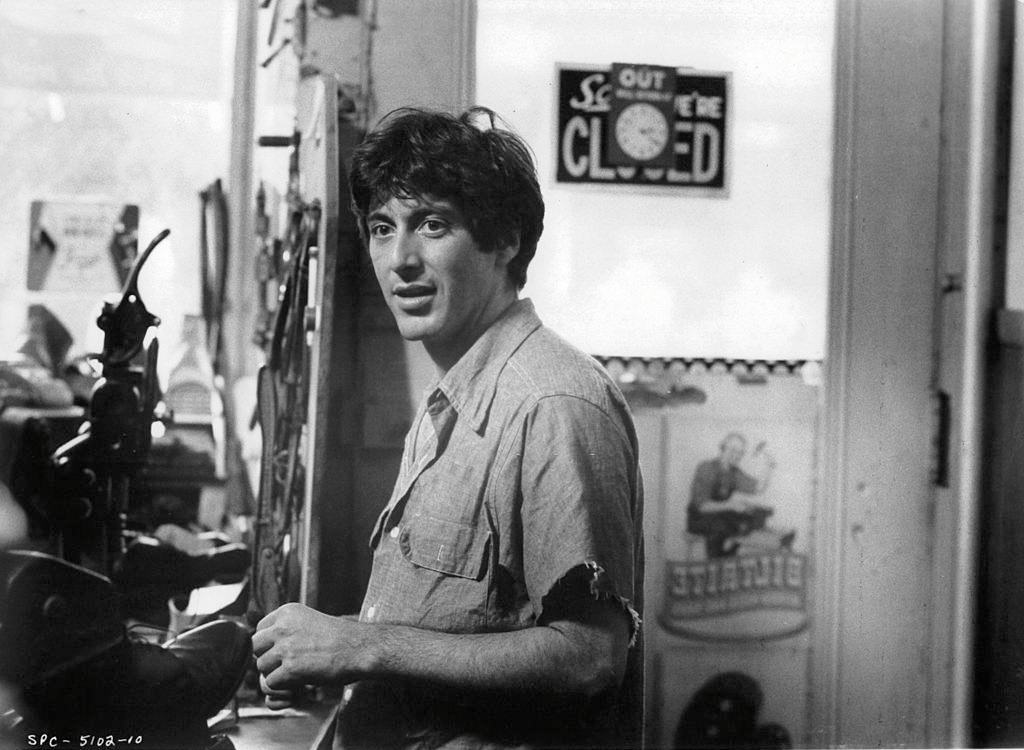 Al Pacino standing in a shoe repair store in a scene from the film ‘Serpico’, 1973.