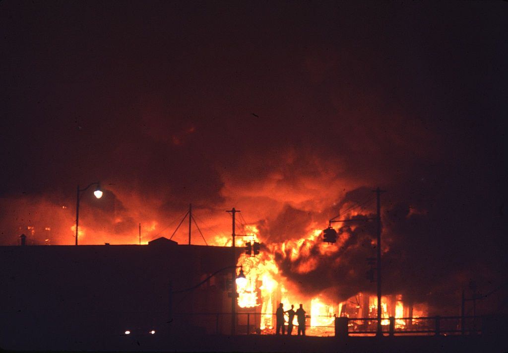 #1 Nighttime view of fires, in the wake of ongoing riots, in the northwest part of town, Detroit, Michigan, 1967