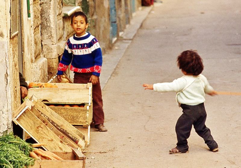 #41 Old souk with a few oranges and carrots for sale, Tripoli, 1970s