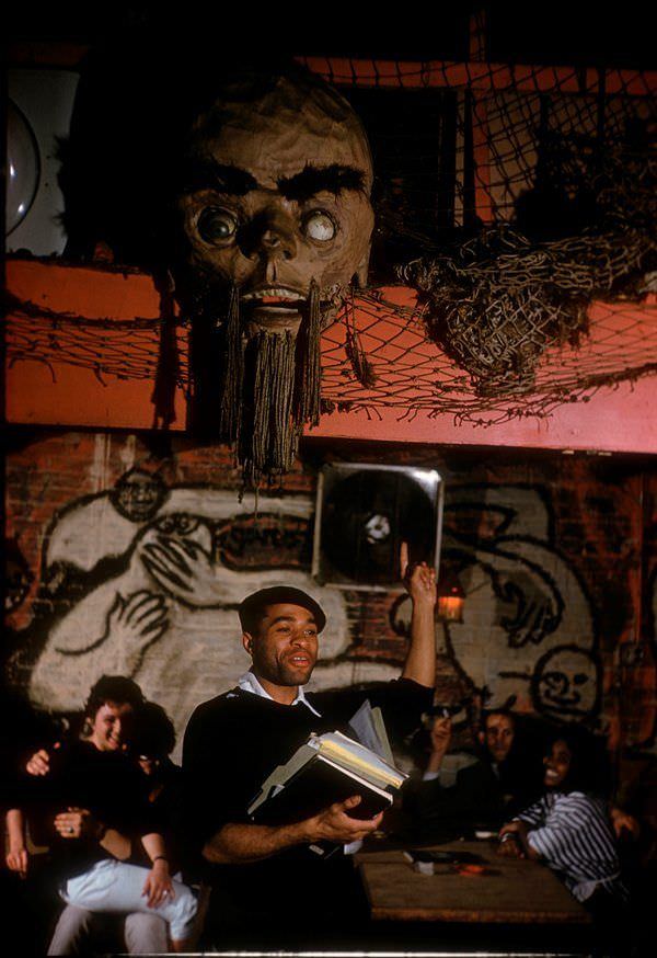 #20 Ted Joans reads poetry at the Bizarre coffee shop in 1959.