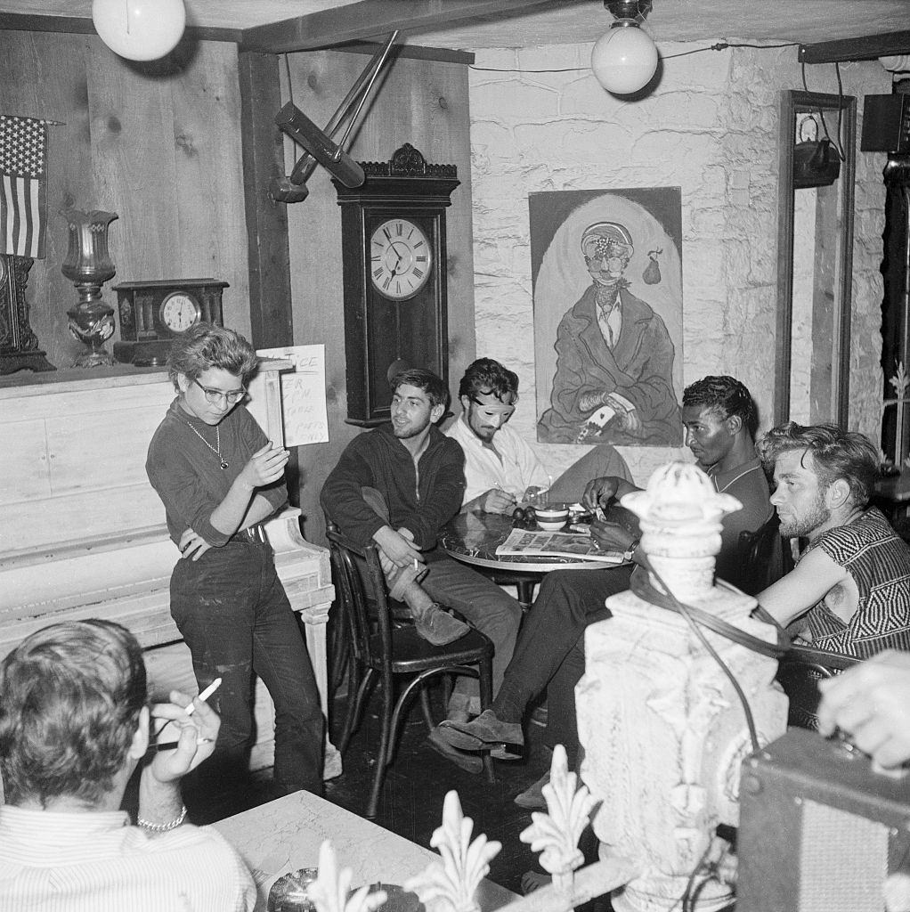 #39 Inside the Beatnik street level coffee shop, the Beatniks make their own entertainment, 1959