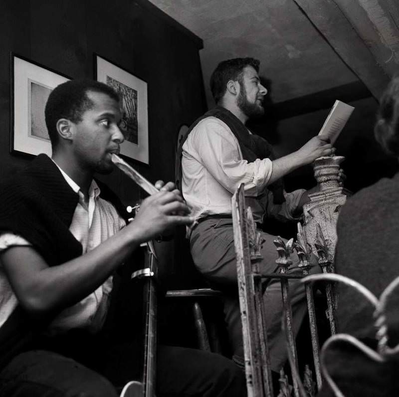 #3 One man recites poetry while accompanied by a flutist, on Thompson Street in Greenwich Village, 1957