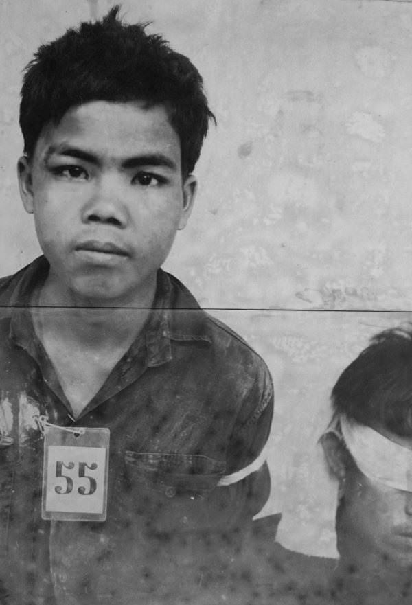 #14 A teen prisoner with his brother.