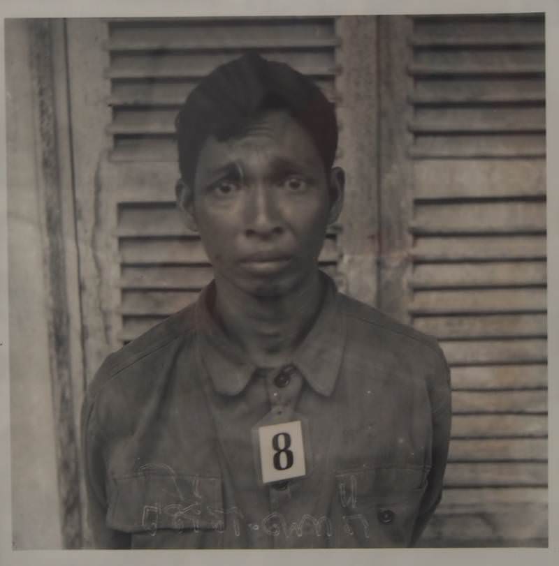 #2 A terrified prisoner inside the Tuol Sleng prison where nearly 20,000 people locked in Tuol Sleng, only seven survived.