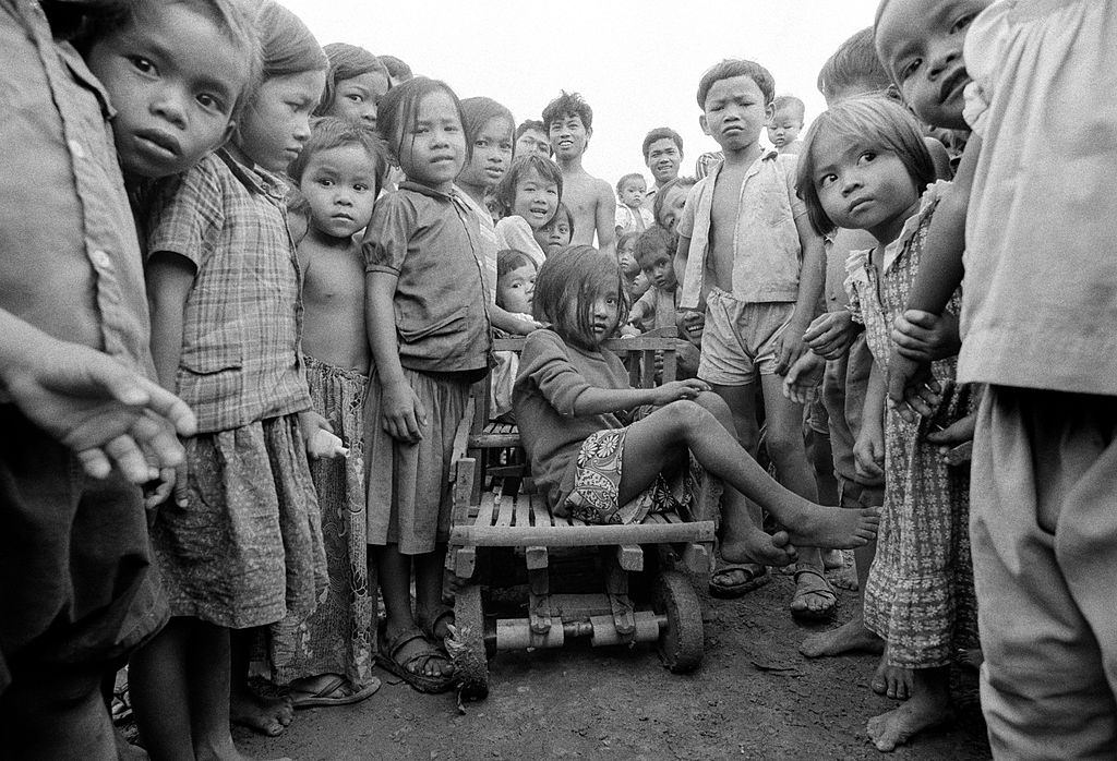 #43 Cambodian refugee children in a refugee camp set up by the UNHCR in Thailand, near the border with Cambodia, 1987.