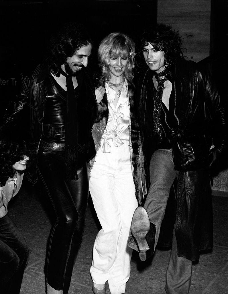 #8 Cyrinda Foxe with Richie Supa and Steven Tyler at the opening party for “Beatlemania” on January 18, 1978 at Jade West Restaurant in New York City.