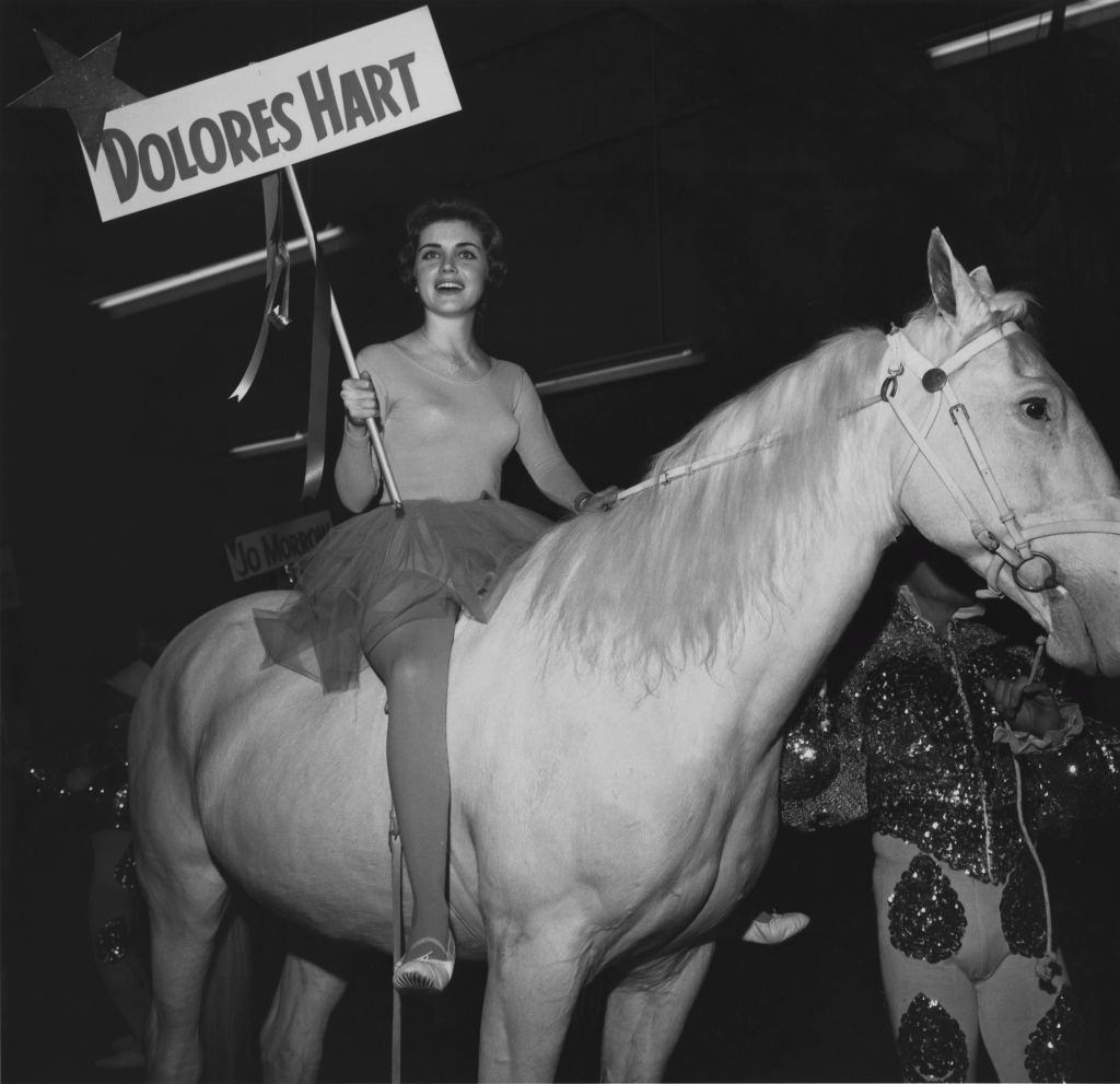 #27 Dolores Hart takes part in a parade at the opening of the Dobritch International Circus at the Los Angeles Arena, 1962