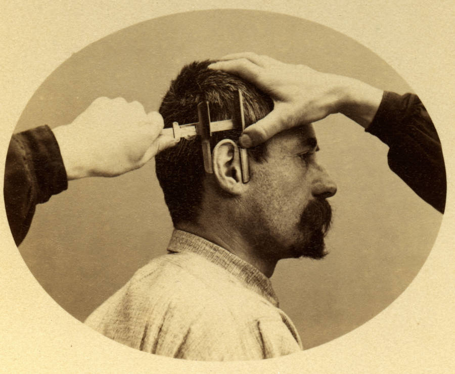 A demonstration of how to measure a criminal’s ear, Paris, 1894
