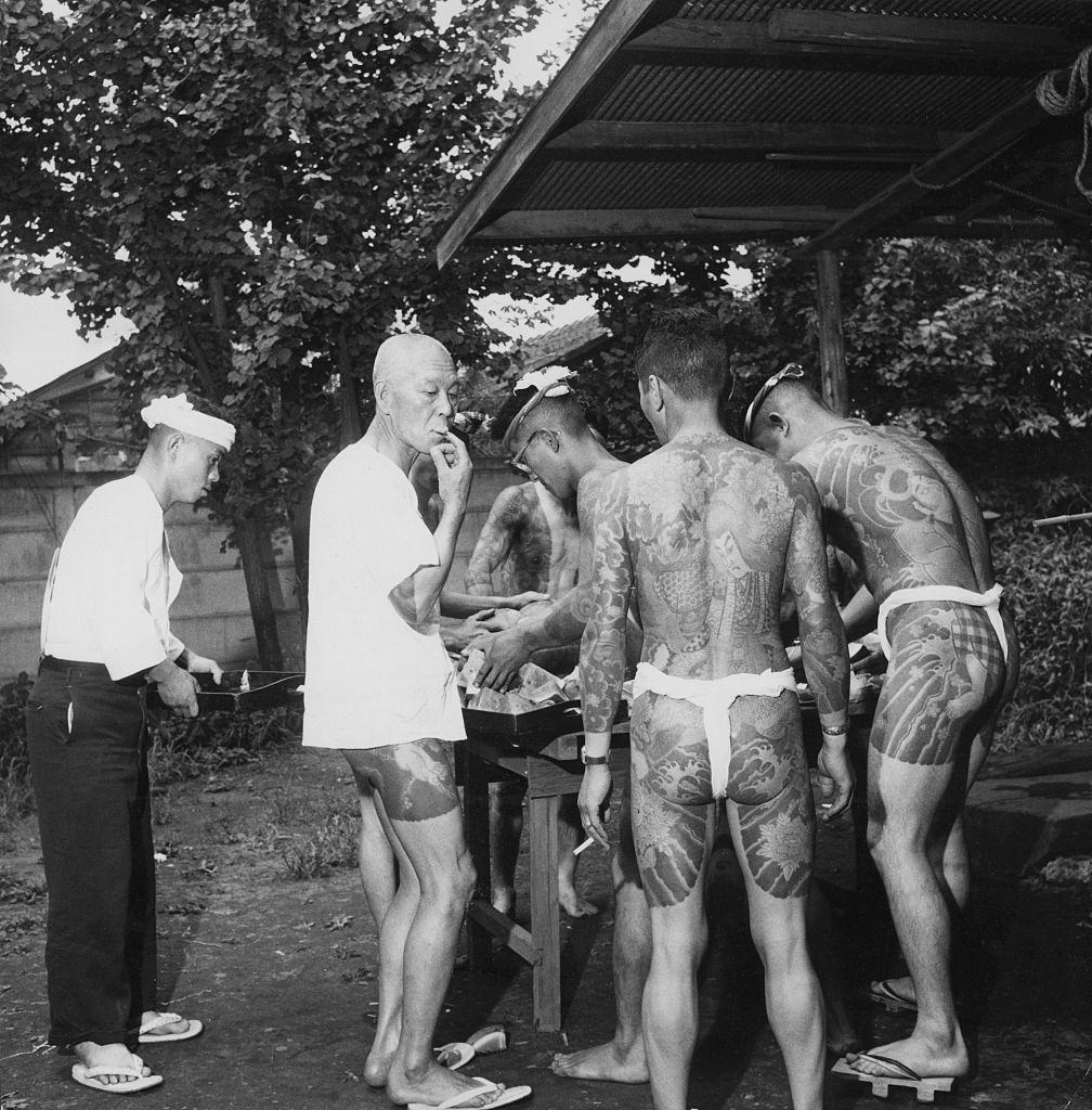 #20 A group of heavily tattooed men, Japan, 1955