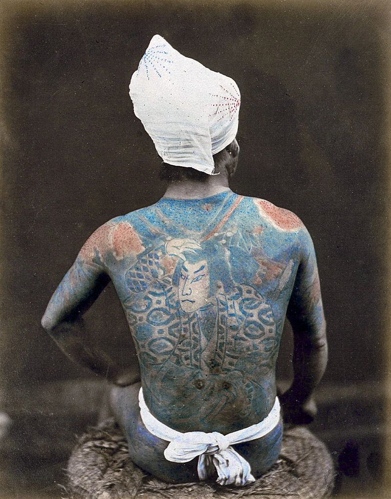 #7 Japanese man with back tattoo Photographed by Felice Beato, 1880s