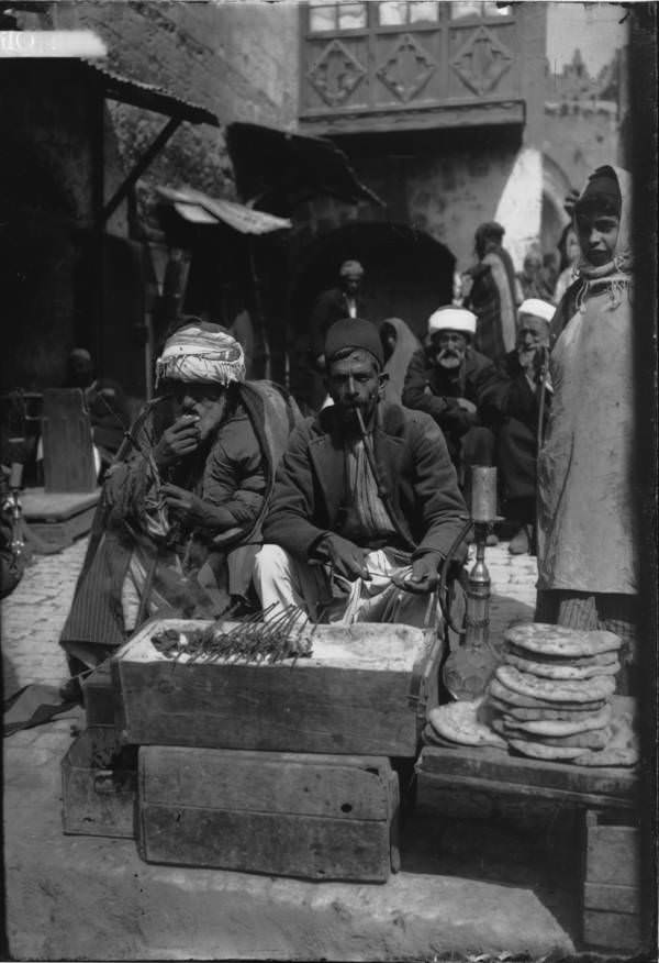 #50 A vendor sells meat and bread, Circa 1900-1920