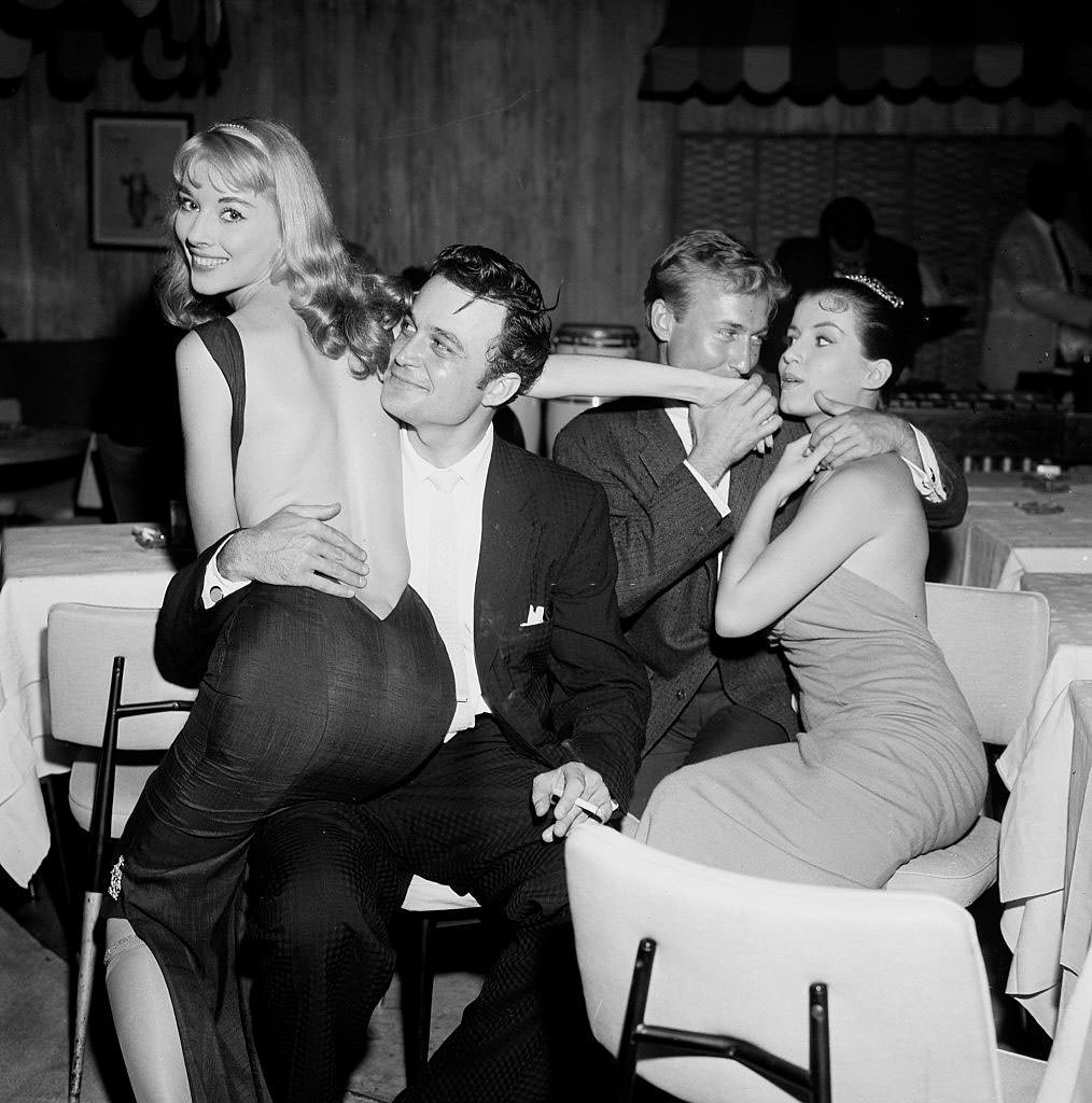 #11 Joan Bradshaw with Nick Adams and Vikki Dougan with Manning Ross, 1957