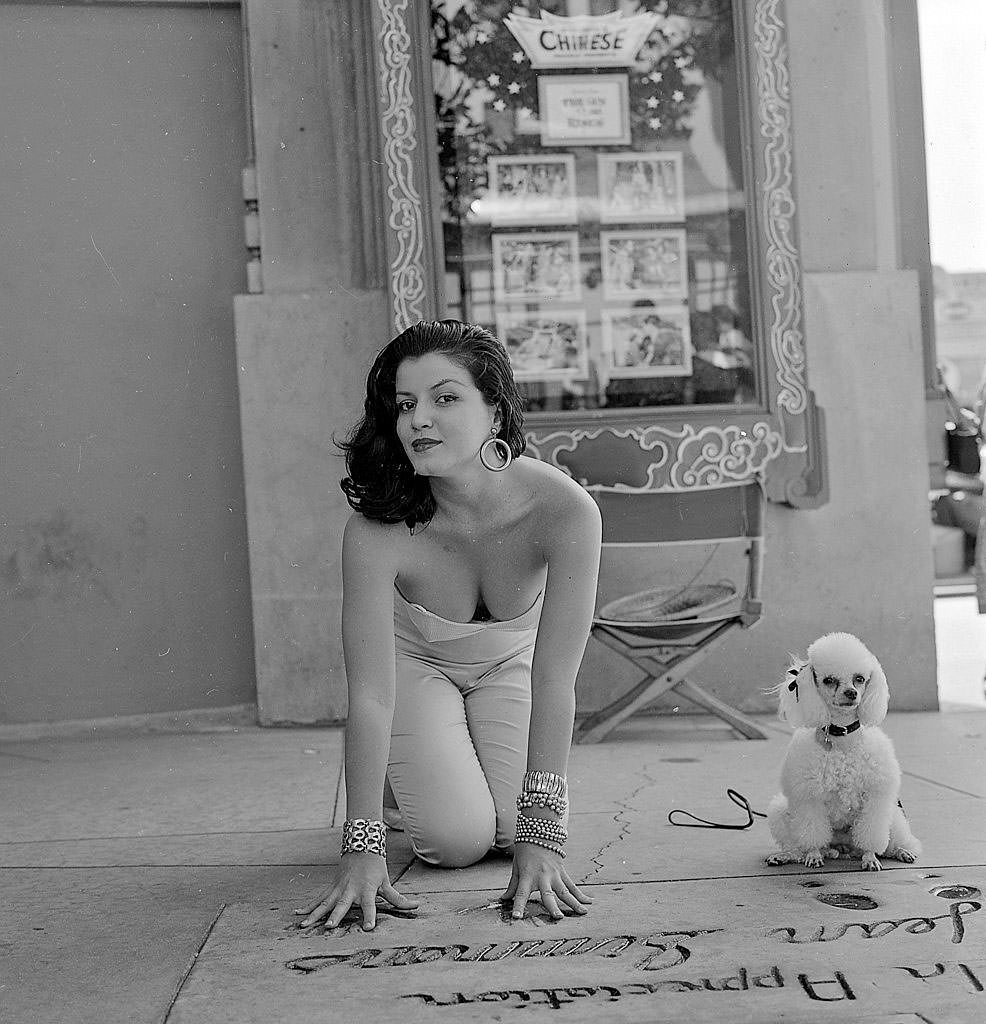 #4 Joan Bradshaw with her dog, Los Angeles, 1957