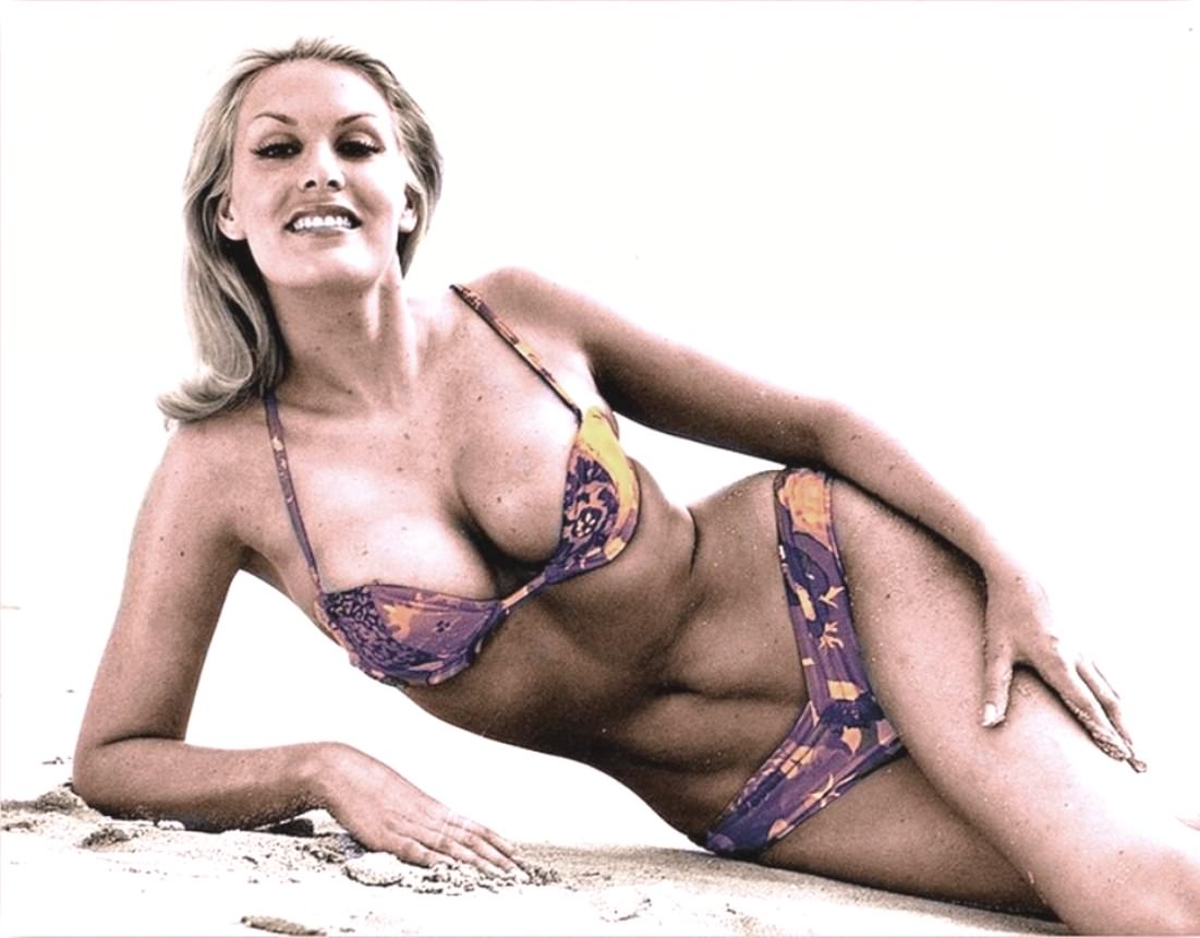 #14 June Wilkinson on the beach, 1960s