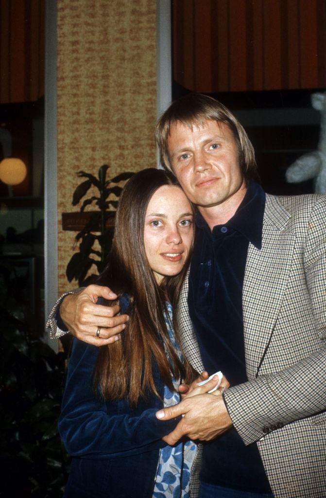 #7 Marcheline Bertrand posing with Jon Voight, 1977