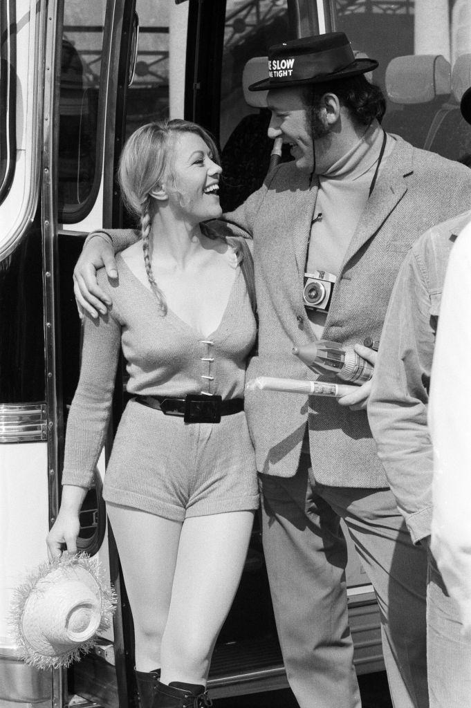 #31 Margaret Nolan with Bernard Bresslaw, during the filming of ‘Carry On’, 1971