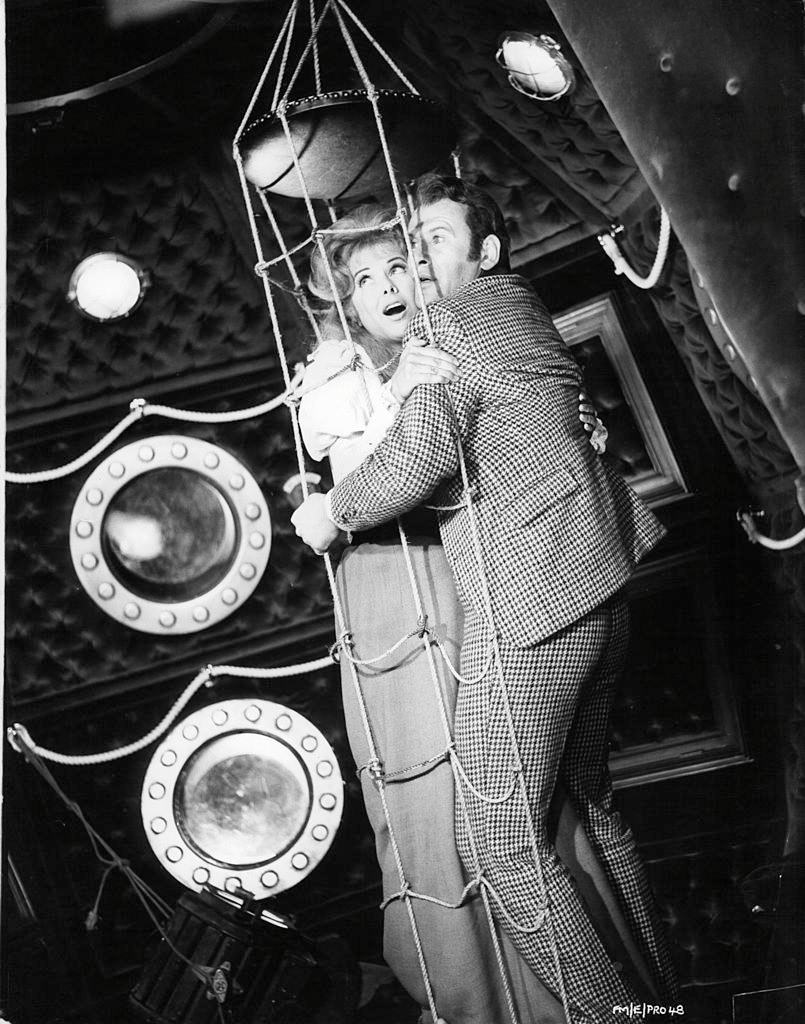 Martha Hyer with Edward Judd in a scene from the film ‘First Men In The Moon’, 1964