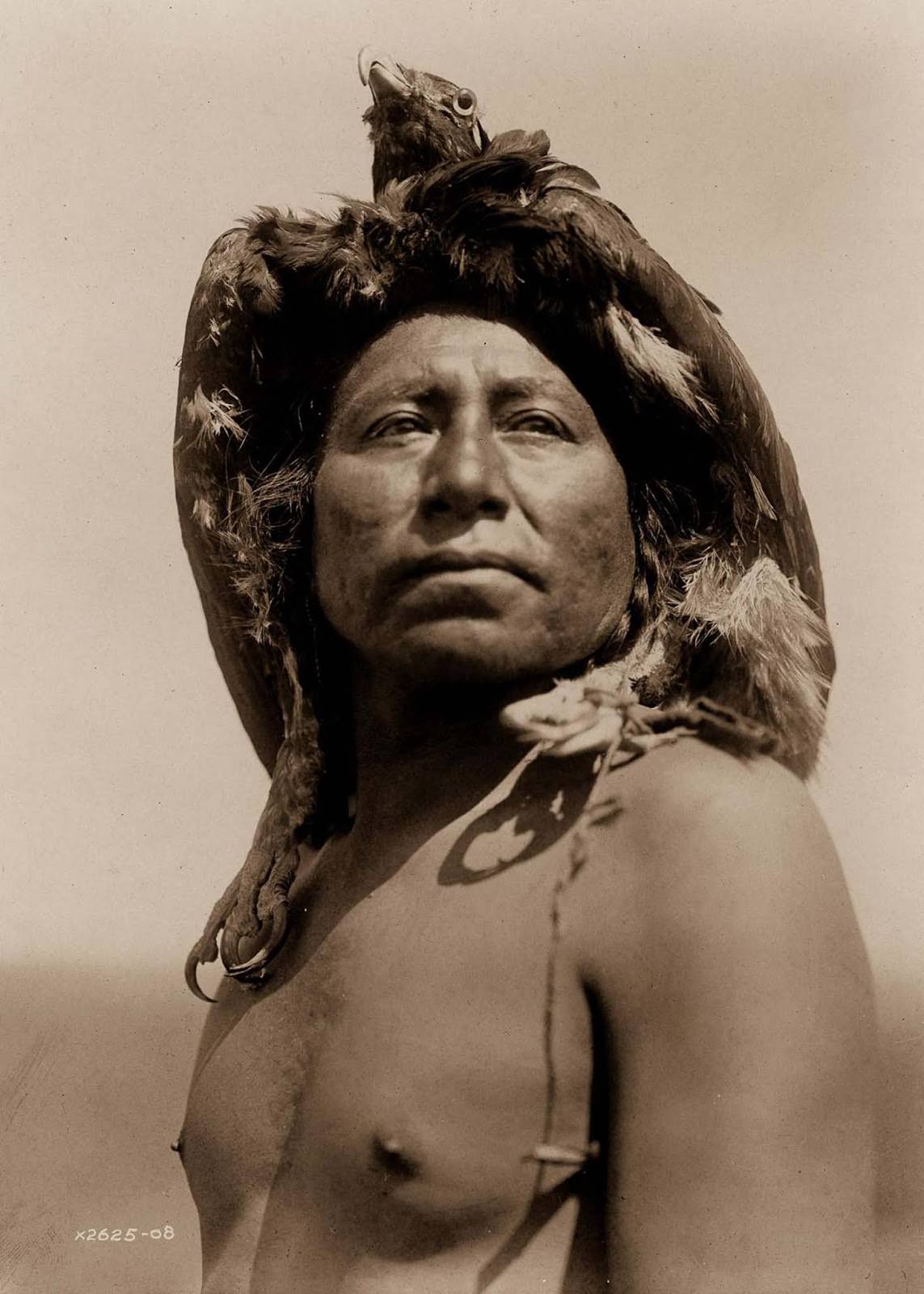 #8 An Apsaroke shaman. 1908.