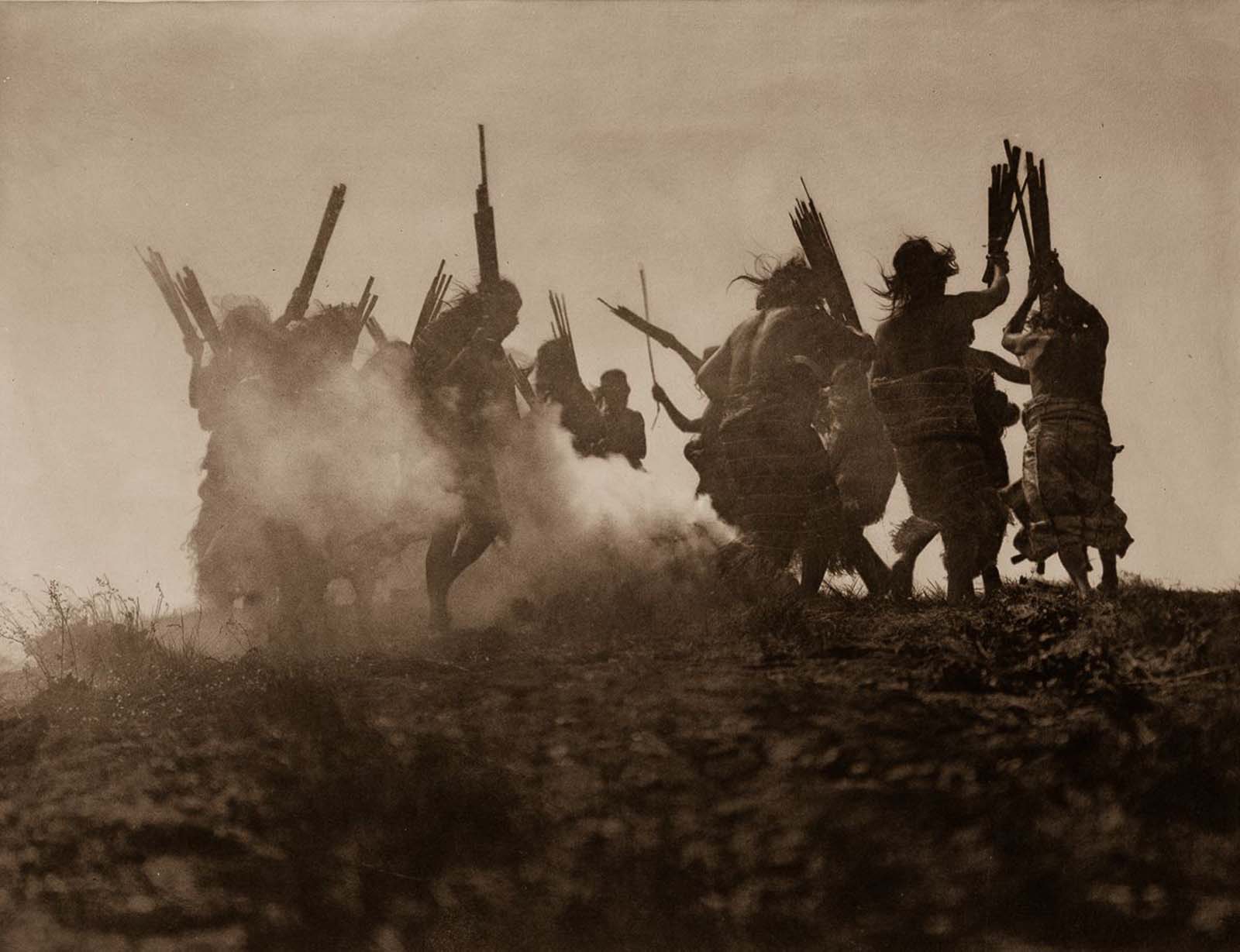 #58 Members of the Qagyuhl tribe dance to restore an eclipsed moon. 1910.