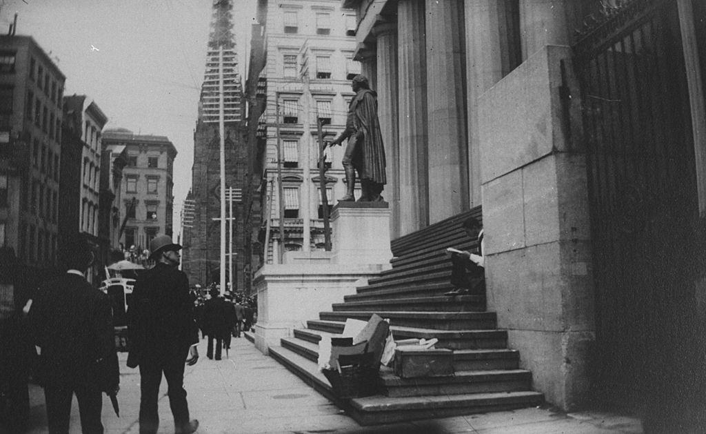 #31 Men walking by the statue of George Washington on Wall St, New York, 1884