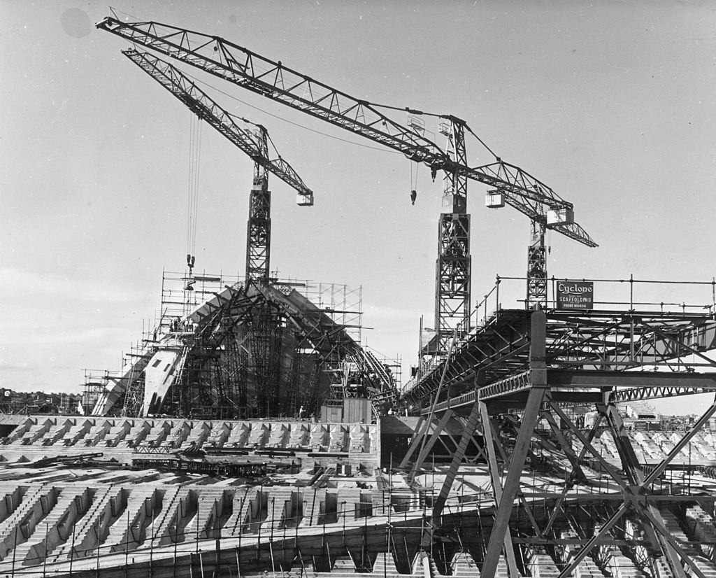 #15 The roof is lifted onto the new Opera House being constructed in Sydney harbour, 10th December 1963