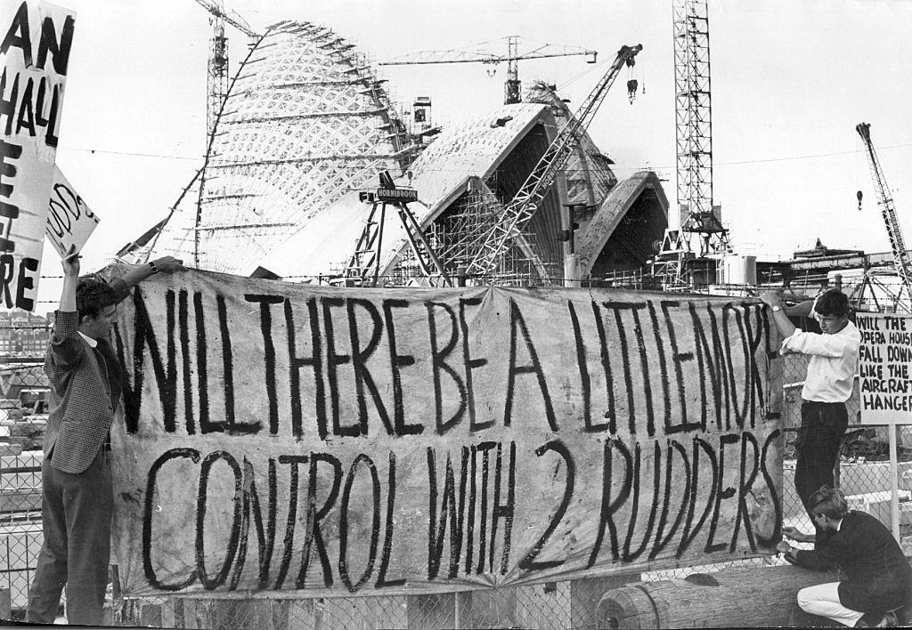 #22 University of Sydney students armed with posters protest against the architects’ appointments for the Sydney Opera House, 20 April 1966.