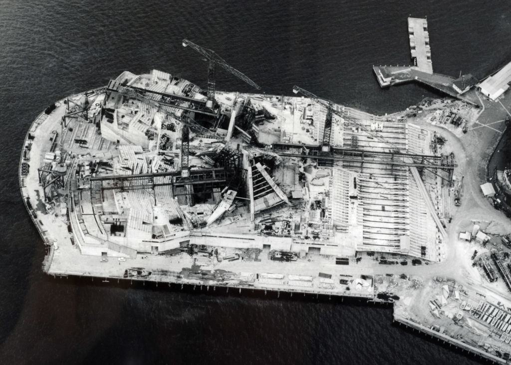 #6 The construction work on the Sydney Opera House as seen from above, An aerial picture looking down on the building work showing the start of the famous shells, 1960