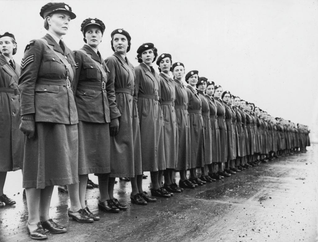 Members of the Women’s Auxiliary Air Force line up for inspection at their London headquarters, England.