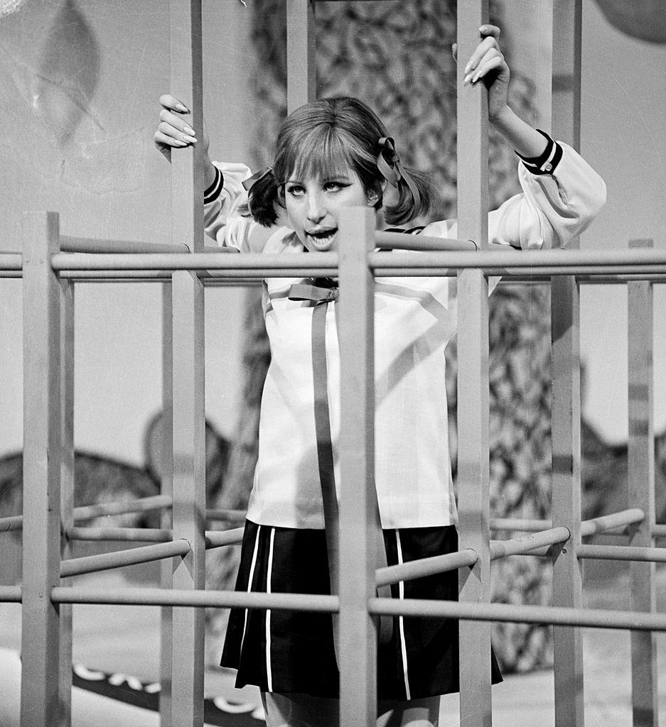 #24 Barbra Streisand performs a song in a jungle gym set dressed as a little girl during her ‘My Name is Barbra’ 1965