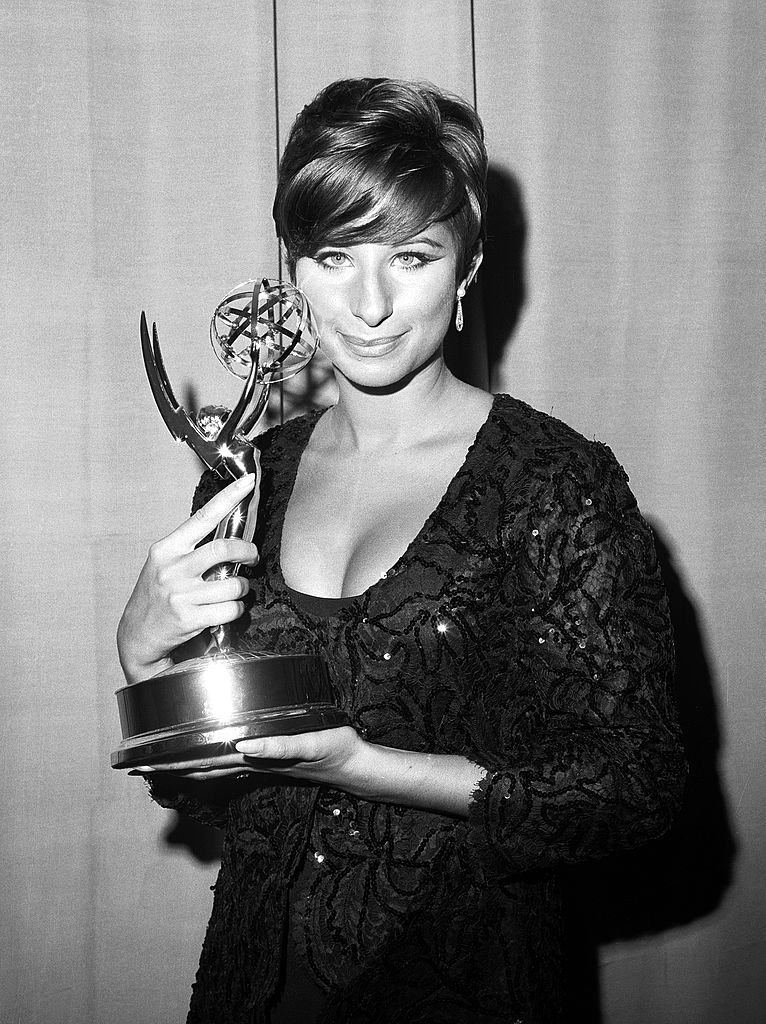 #26 Barbra Streisand poses with her Emmy at the Emmy Awards, 1965