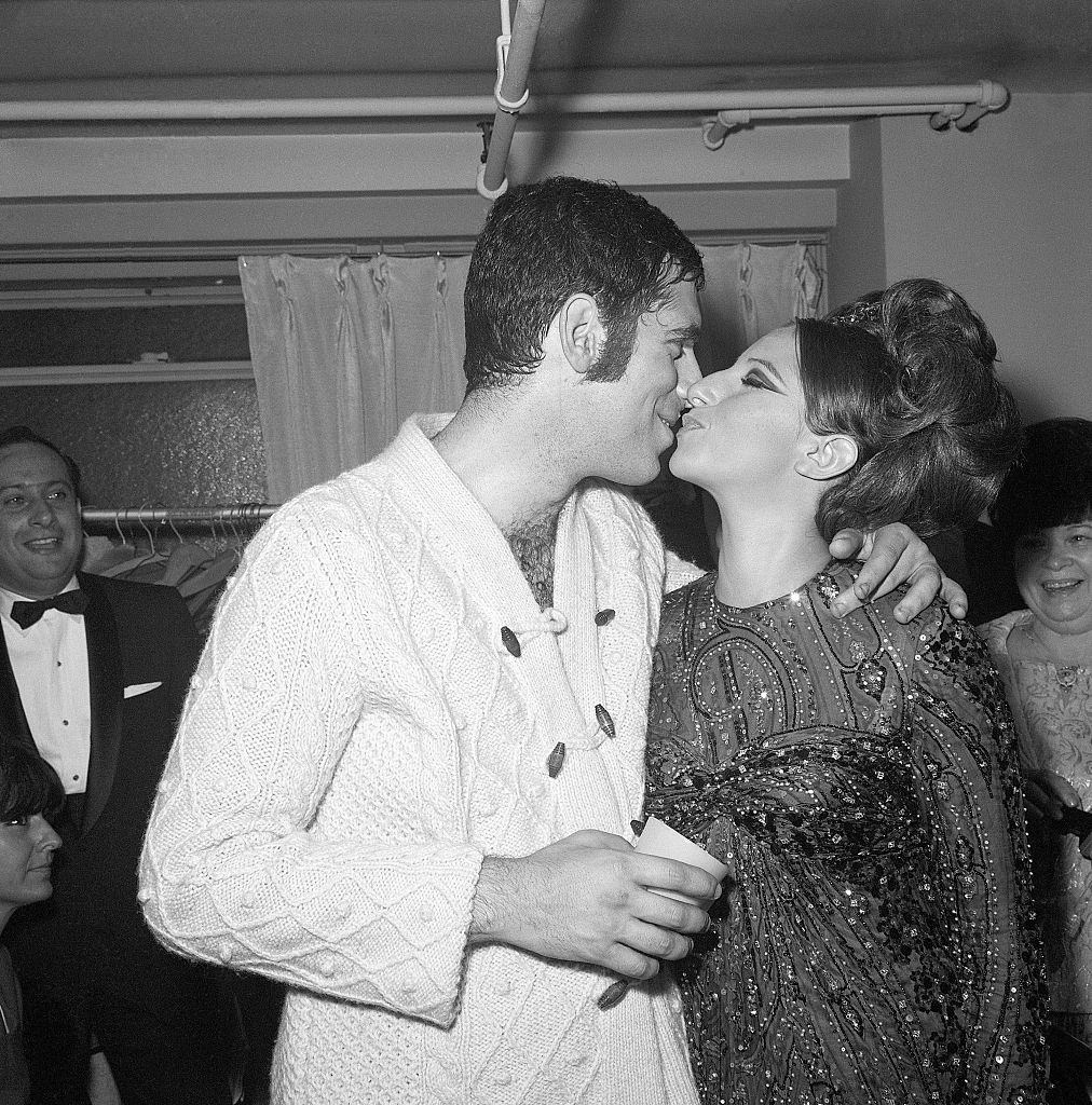 #27 Barbra Streisand kissing Elliott Gould, 1965