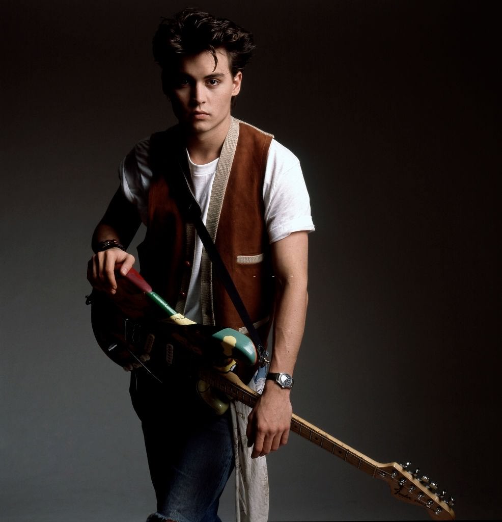 #5 Young Johnny Depp with his guitar in 1987 in New York City
