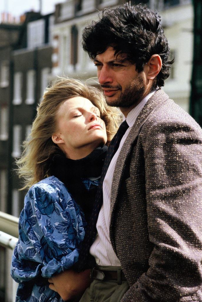 Michelle Pfeiffer with Jeff Goldblum pose on set during filming of ‘Into The Night’, 1985